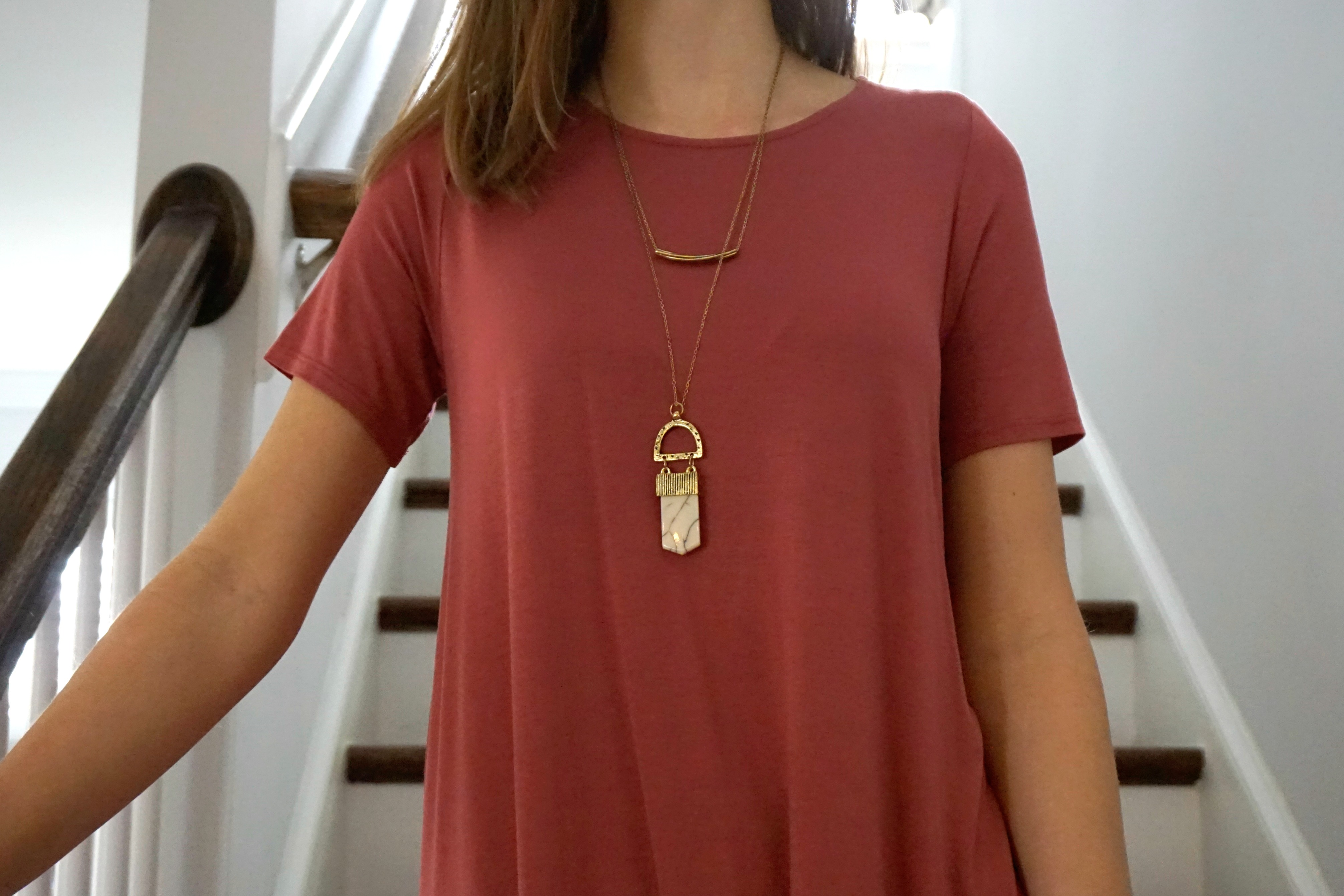 Layered amulet necklace made by fair trade artisan co-op in India | Fairly Southern