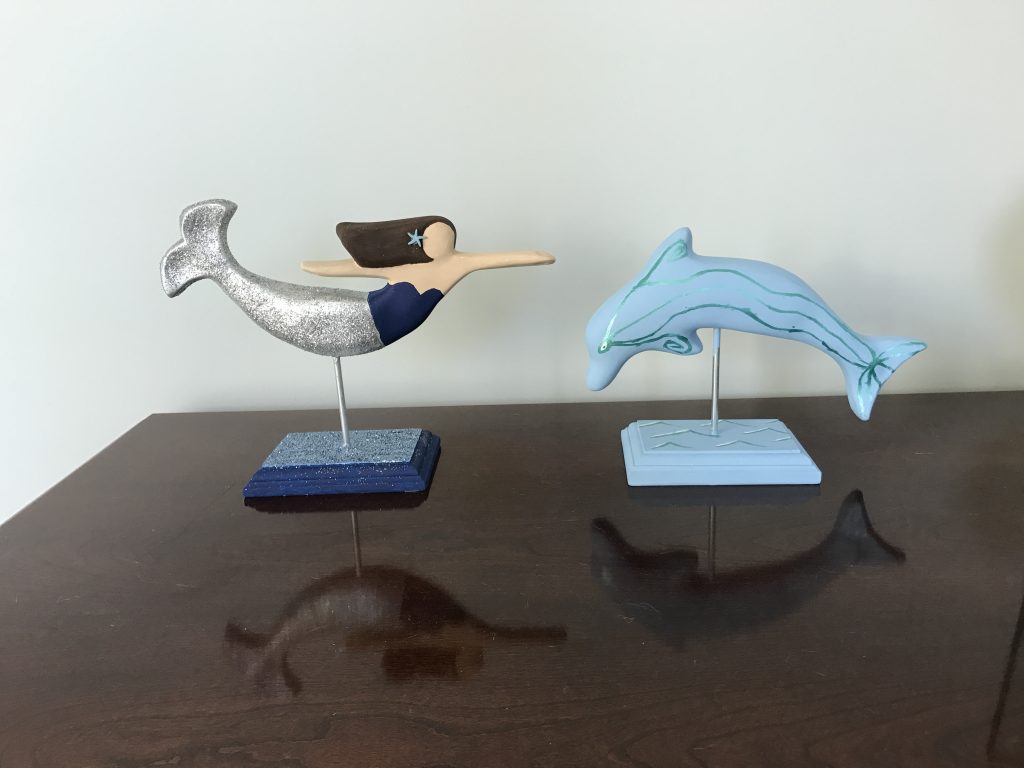 Ceramic mermaid and dolphin from The Mermaid Factory in Norfolk, VA | Fairly Southern