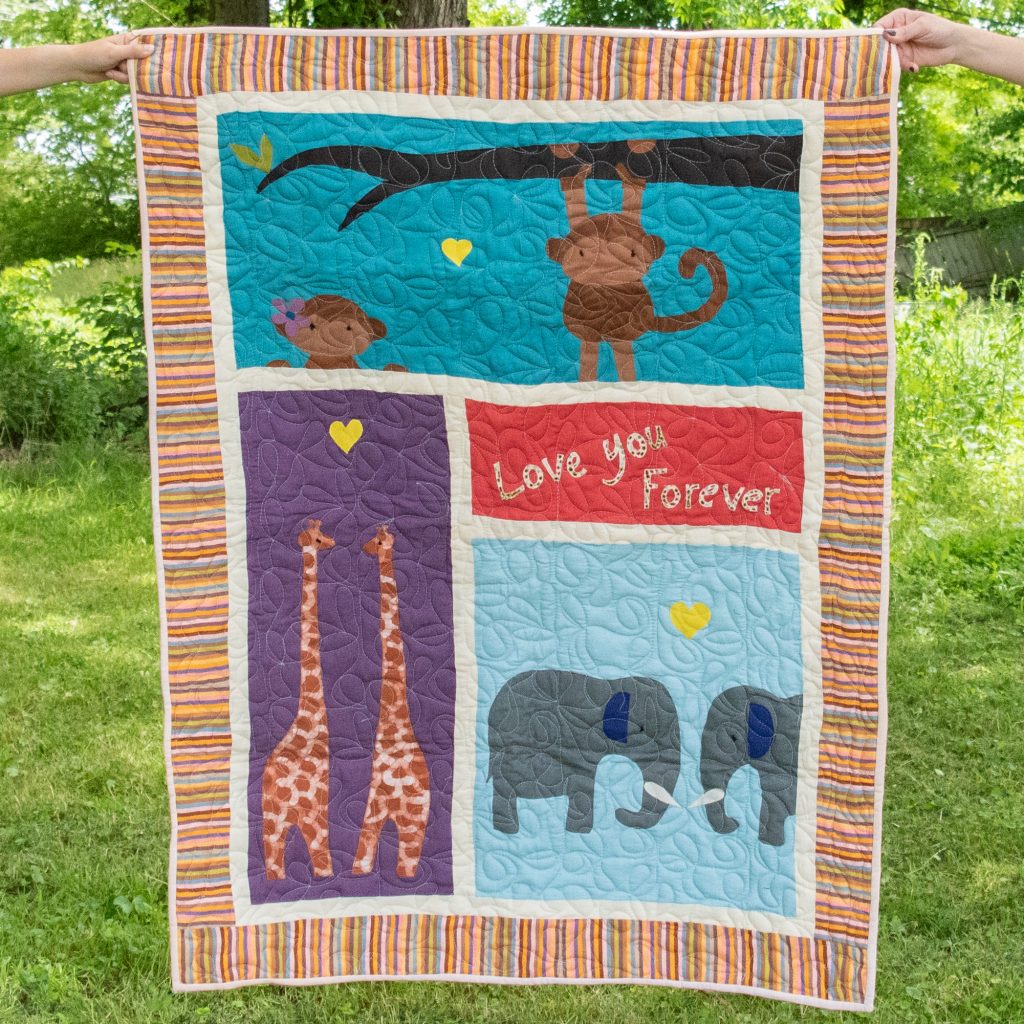 Animal themed "Love You Forever" baby quilt by Amani ya Juu - Fair Trade Home Goods made by artisans in Africa  |  Fairly Southern